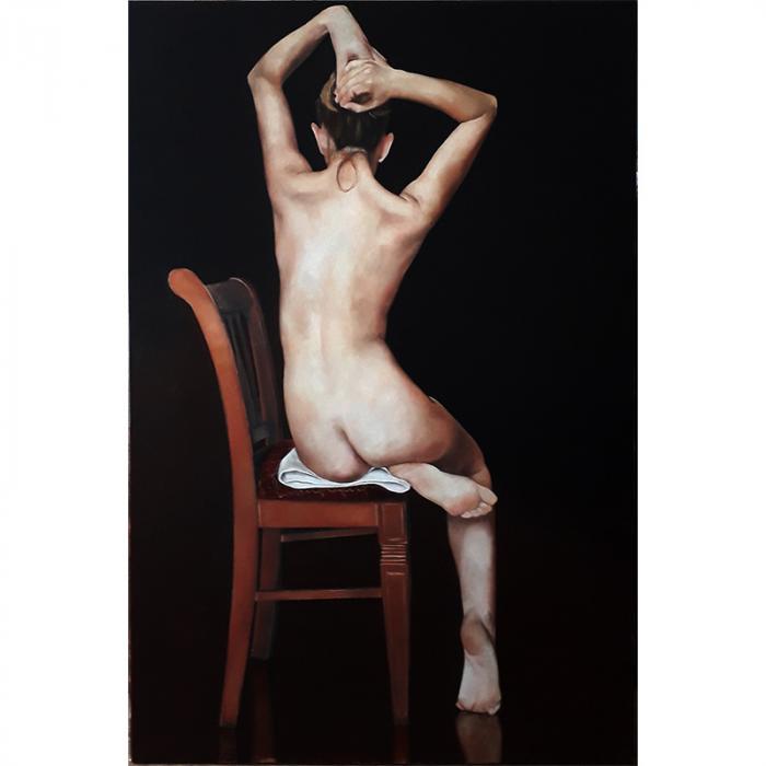 Studio di nudo femminile seduto di schiena